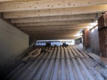 Surélévation d'une maison avec charpente toit plat en bois à Marseillan